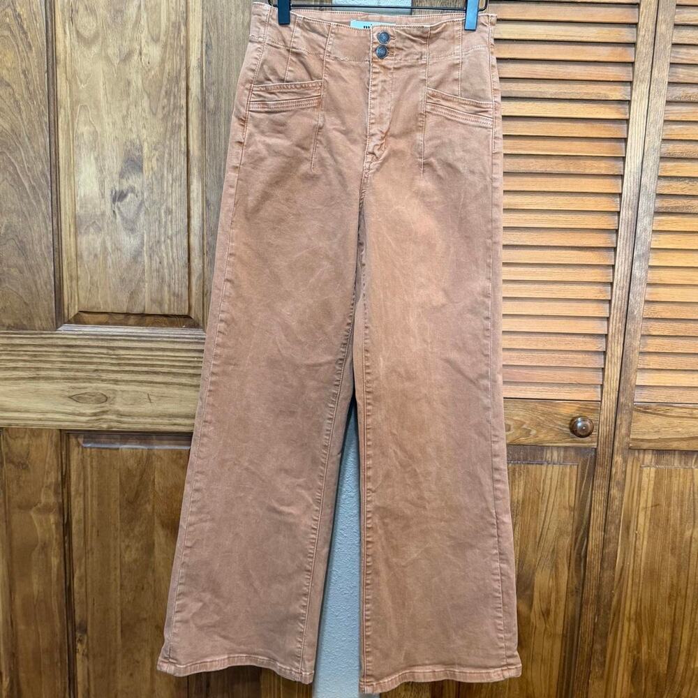 Tan highwaisted wide leg trouser with front angled pockets
